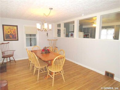 Dining Room Formal Dining with open windows to Kit