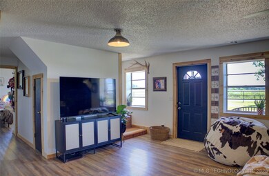 The stairs are near the front door.  You will be blown away by the stunning designer antelope carpet going up the stairs.