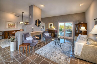 Living Room w/ High Ceilings & Fireplace