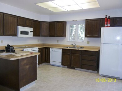 Kitchen with slider to deck