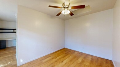 Unfurnished room with light wood finished floors a