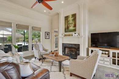 Living room features a gas fireplace with TV conne