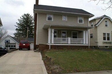 Nice newer concrete driveway.  Large covered porch