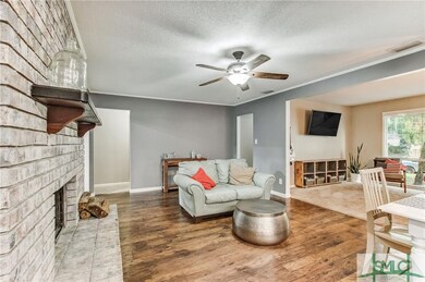 Sitting Area w/ Wood Burning Fireplace
