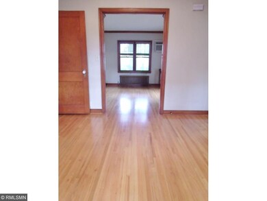 Take in the gorgeous, hardwood floors as you enter