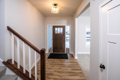 Spacious foyer with adjacent flex room
