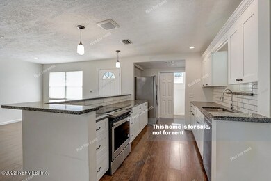 6879 Snow White Dr, Jacksonville, FL 32210 - photo 4