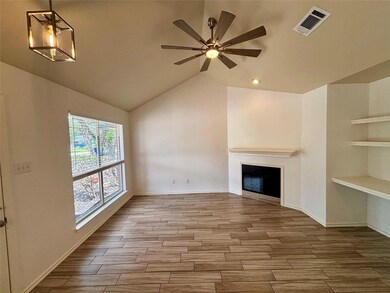 Unfurnished living room with wood tiled floors, a