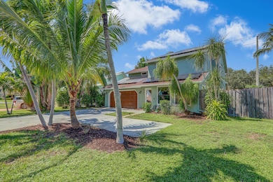 1103 Rainwood Cir W, Palm Beach Gardens, FL 33410 - photo 2