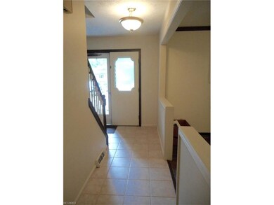 Newer ceramic tile floor in the long foyer. Double