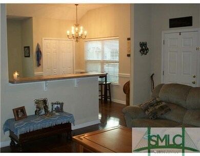 Living Room. Living Room is open to Kitchen with B