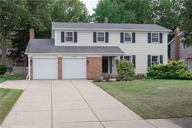 View of front of home featuring a garage and a fro