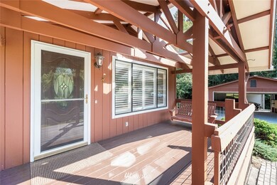 Welcome home! Note the front porch swing.