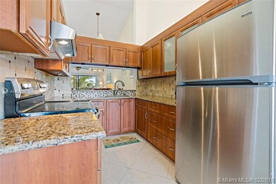 Kitchen with quartz countertops and stainless stee