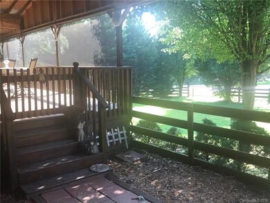 huge front deck that is partially screened