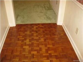 ABSOLUTELY beautiful parquet wood flooring in foye