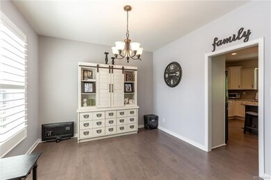 Dining Room to the front left of the home
