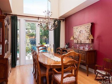 formal living room with custom added French doors 