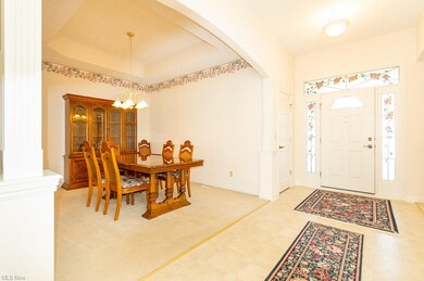Formal Dining Room off Foyer, Opens to Great Room.