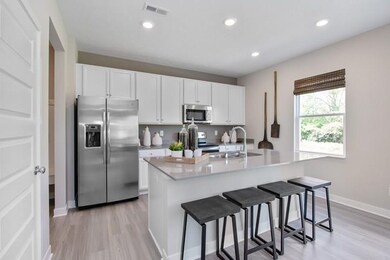 Photos shown may be an artist rendering, model home, or of the same model due to current construction stage different location. 