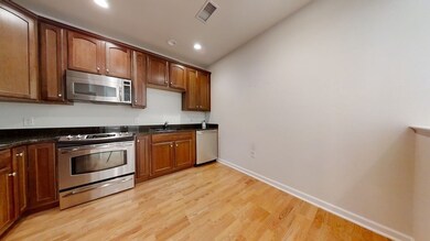 Wellington Crossing unit 202, Waltham, MA 02452 - photo 4