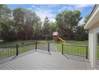 Half-acre wooded lot with newer maintenance free d