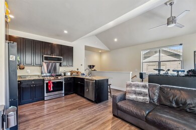 Kitchen with stainless steel appliances, lofted ce