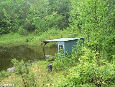 Exterior Front - boat house on 2 acre lake with pi