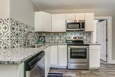 All new cabinets and stainless steel appliances give this kitchen an updated look.
