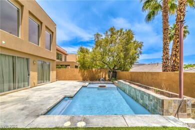 View of pool featuring a patio and a fenced backya