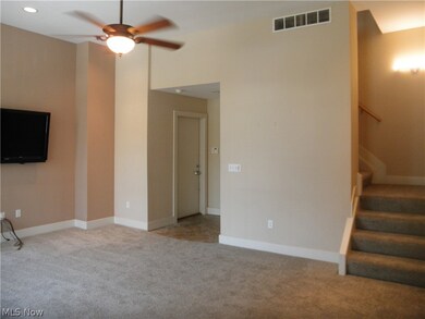 Door across room is the entrance to the garage (basement access, too)