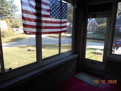 Glass enclosed front porch