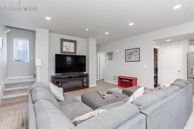 Living room featuring light wood-type flooring