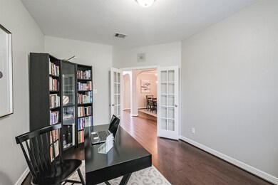 The handsome study, with french doors for privacy, is located at the front of the home to the left as you enter the home. The perfect secluded spot for working from home