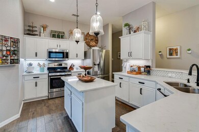 quartz countertops and ss appliances