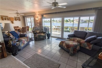 family room and breakfast table with view of basin