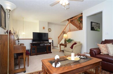 Living Room opens to the Foyer and Beautiful Oak b