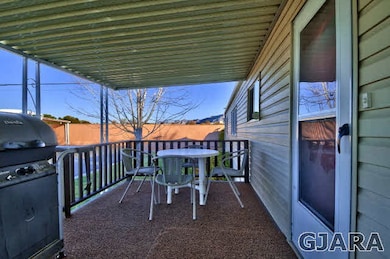 Covered Front Porch Adds Outdoor Living Space