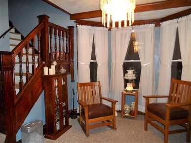 Welcoming Front Foyer w Bay Window.
