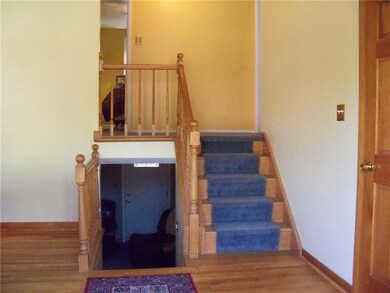 Entry shows the gorgeous oak wood work in the home