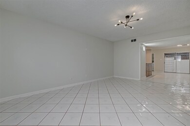 A large living room greets you upon entry.