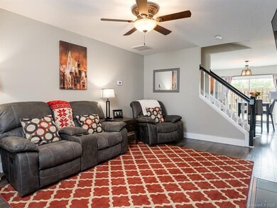 Spacious, well lit living room.