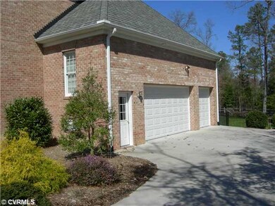 Exterior Front - 3 Car Garage, Concrete Driveway
