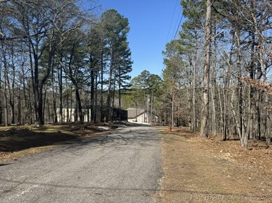 Treed drive to property