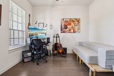 Office space featuring dark wood-type flooring