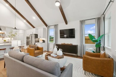 Great Room with vaulted ceiling and stained ceiling beams