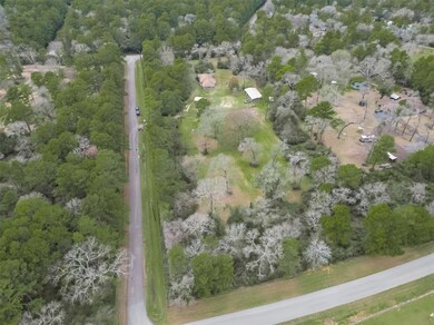 A variety of attractive tall oak
and pine trees adorn the property.