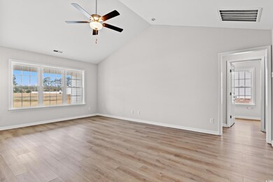 Interior space featuring visible vents, light wood