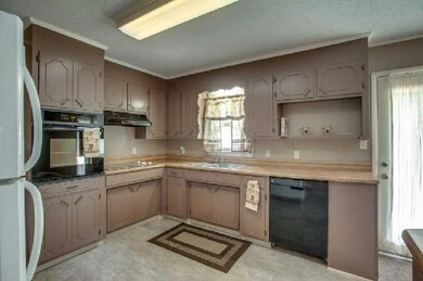 kitchen features all new appliances including dishwasher, glass cooktop, built-in range and refrigerator
