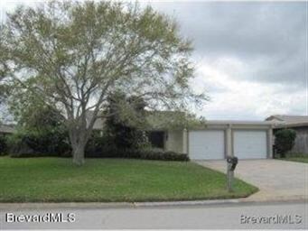 Home front w/double car garage